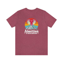 Load image into Gallery viewer, Abortion is Healthcare Shirt - Vintage Grunge Style Pro Choice Safe Legal Abortion Uterus Reproductive Rights Feminist Bella Canvas Unisex

